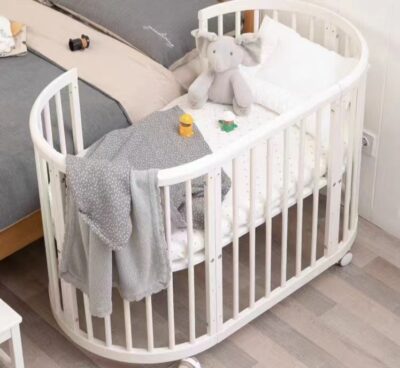 White Oval Baby Crib Convertible to Kids Sofa, Study Desk and Play Bed